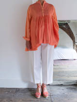 pleated shirt of orange silk