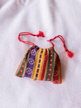 drawstring pouch red purple yellow striped