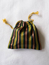 drawstring pouch black red green yellow striped
