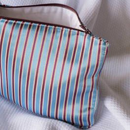 Subcategory: toiletry bags made of striped fabric